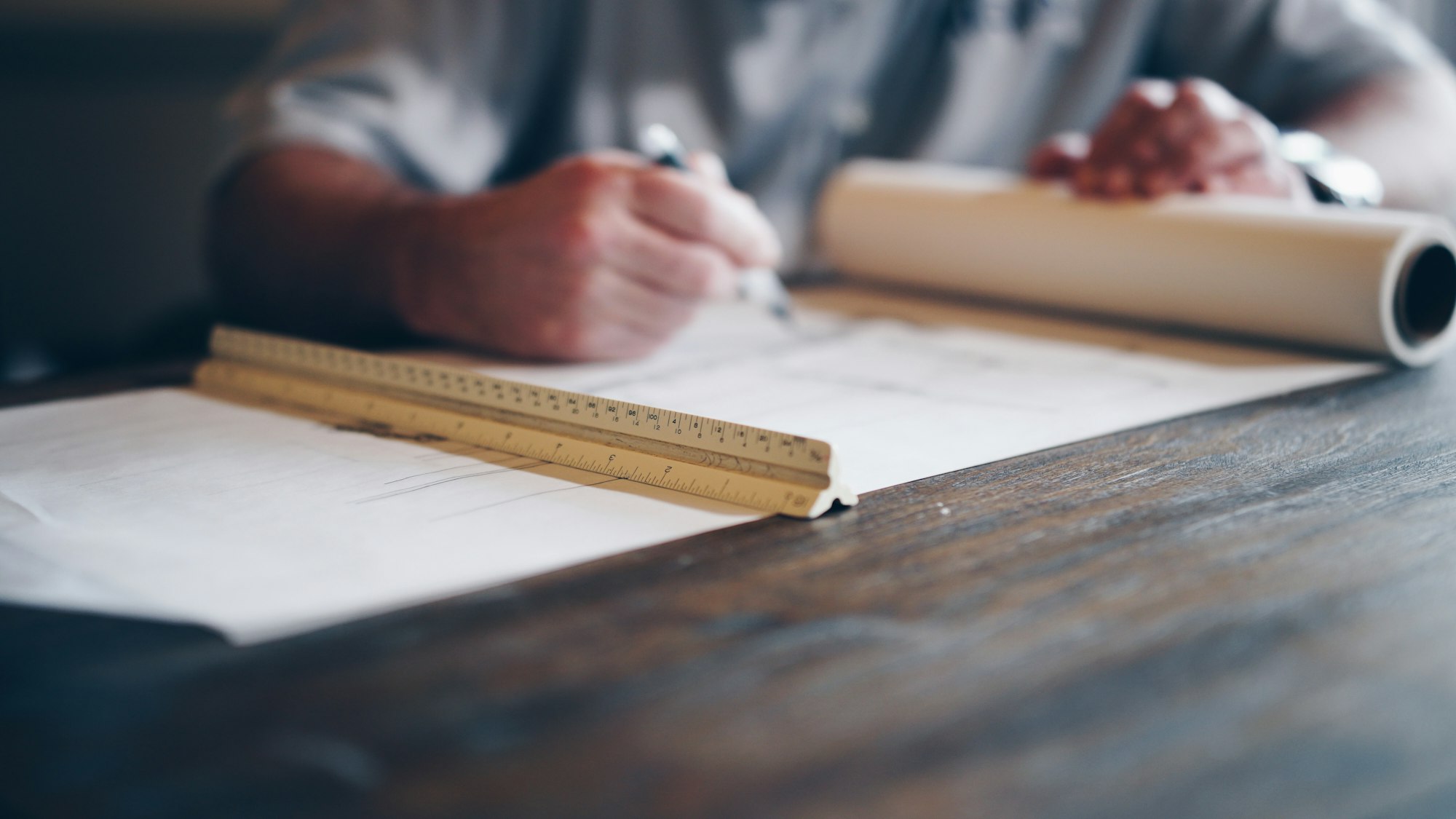 Engineer drafting on a blueprint