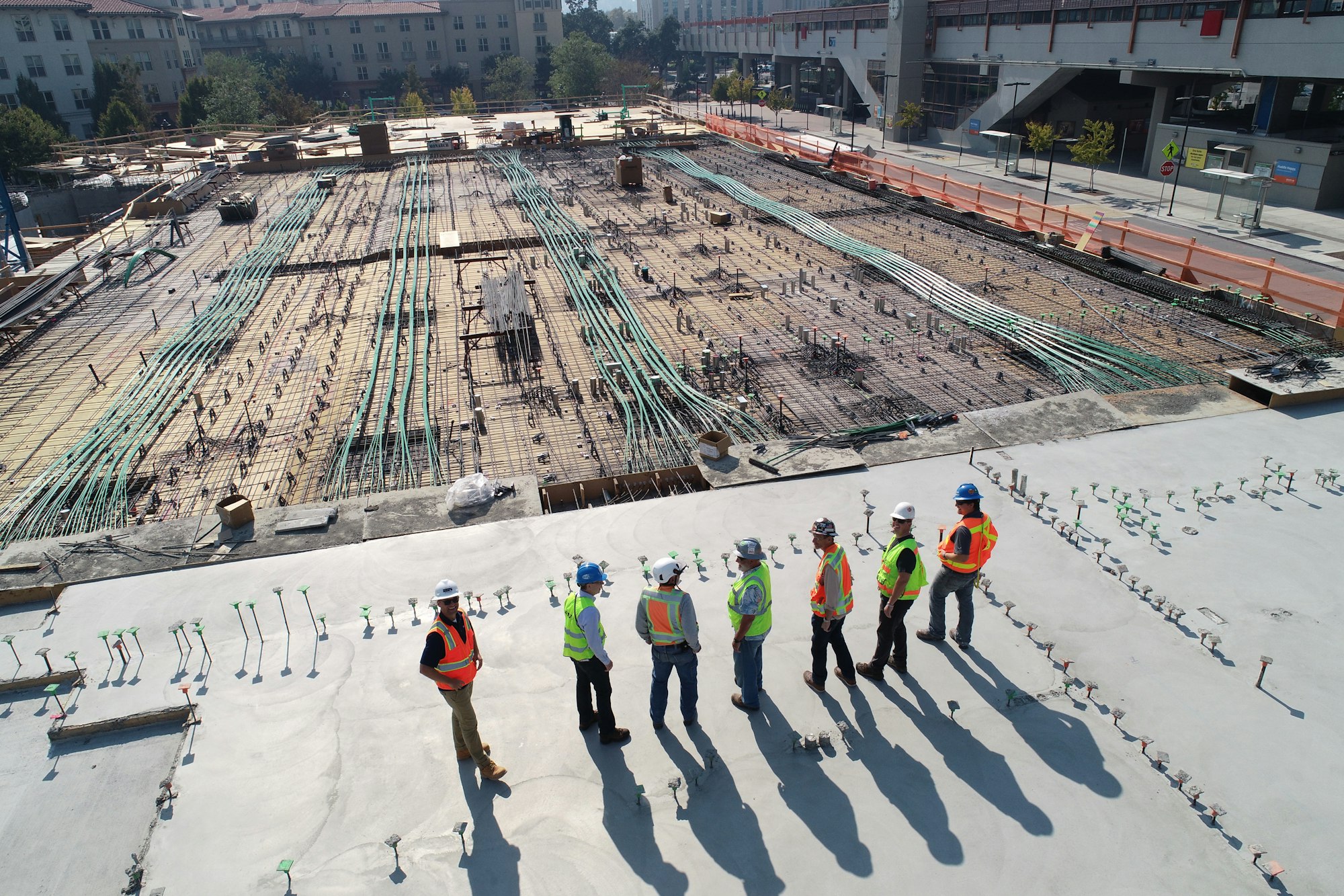 Construction team in safety gear on site